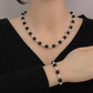 White & Black Contrast Pearl Necklace & Bracelet Set – Elegant Duo Jewelry