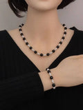 White & Black Contrast Pearl Necklace & Bracelet Set – Elegant Duo Jewelry