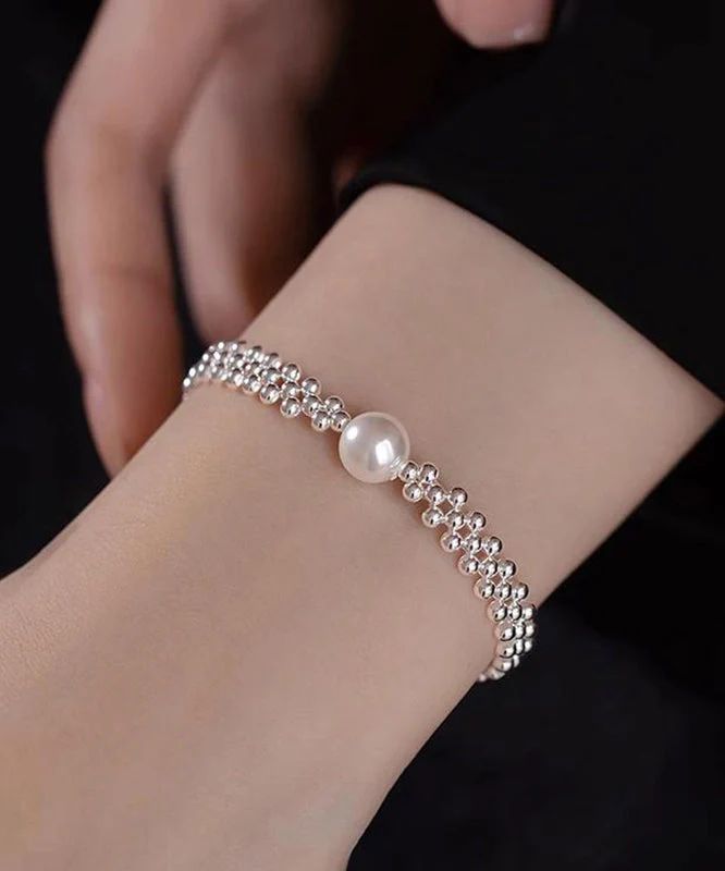 Elegant Silver Beaded Mesh Bracelet with Solitaire Pearl Center